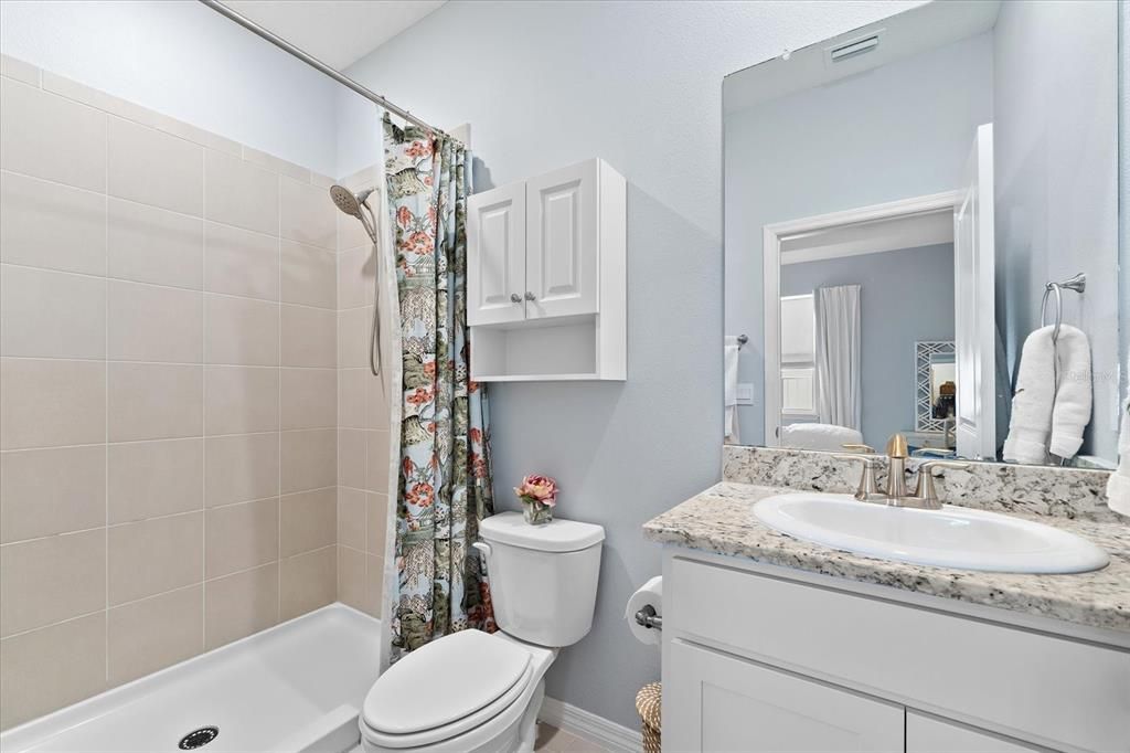Multi generational bathroom with a walk-in shower.
