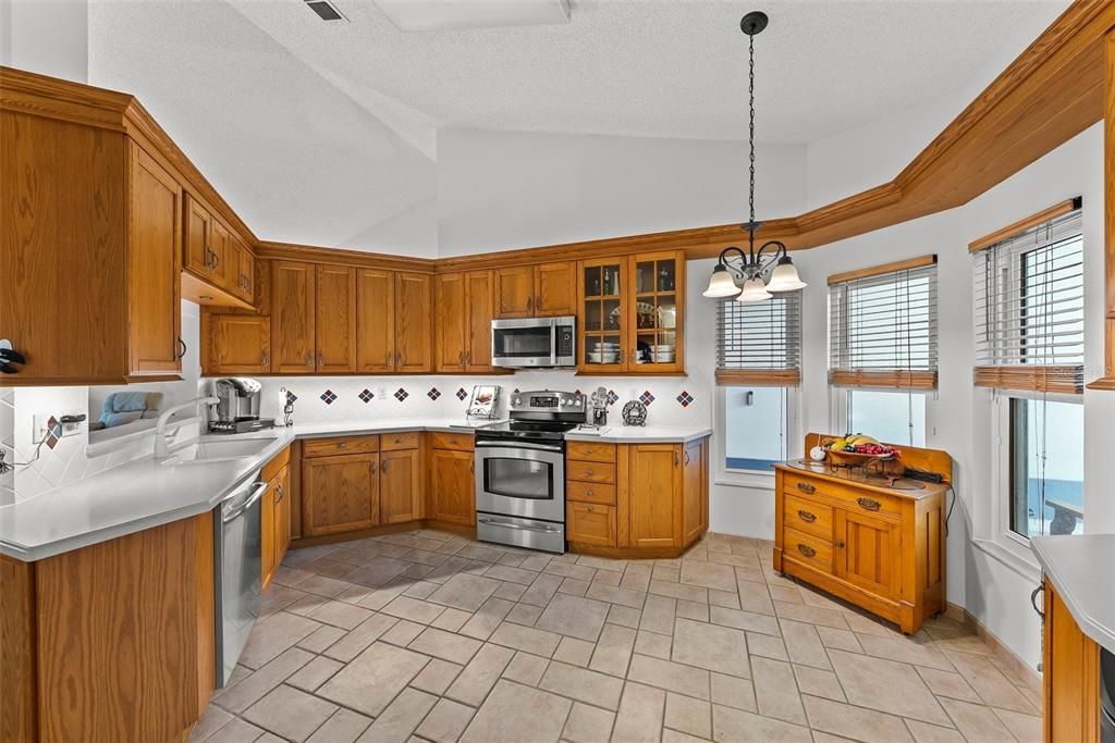 Another view of this spacious and bright kitchen!