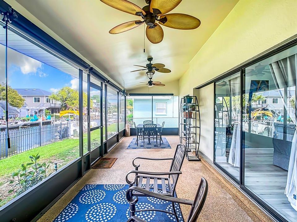 Screened porch overlooking canal