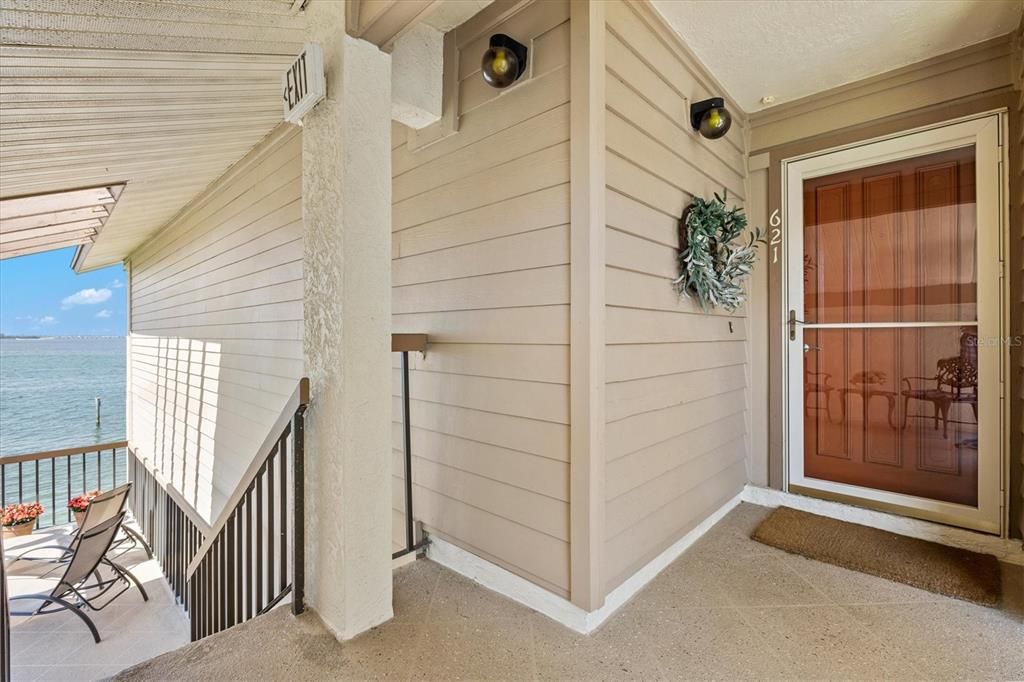 Front door entry and sundeck to the left.