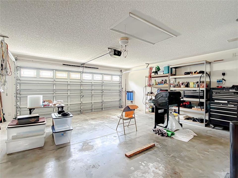 spacious garage for golf cart and vehicle/pull down to attic