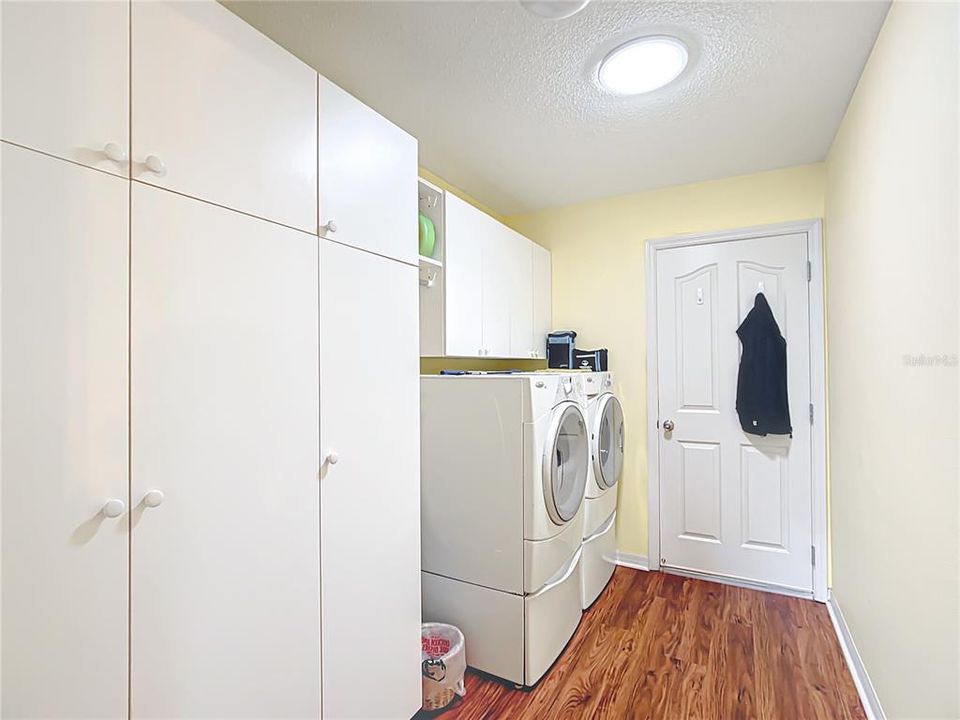 large utility space with washer and dryer