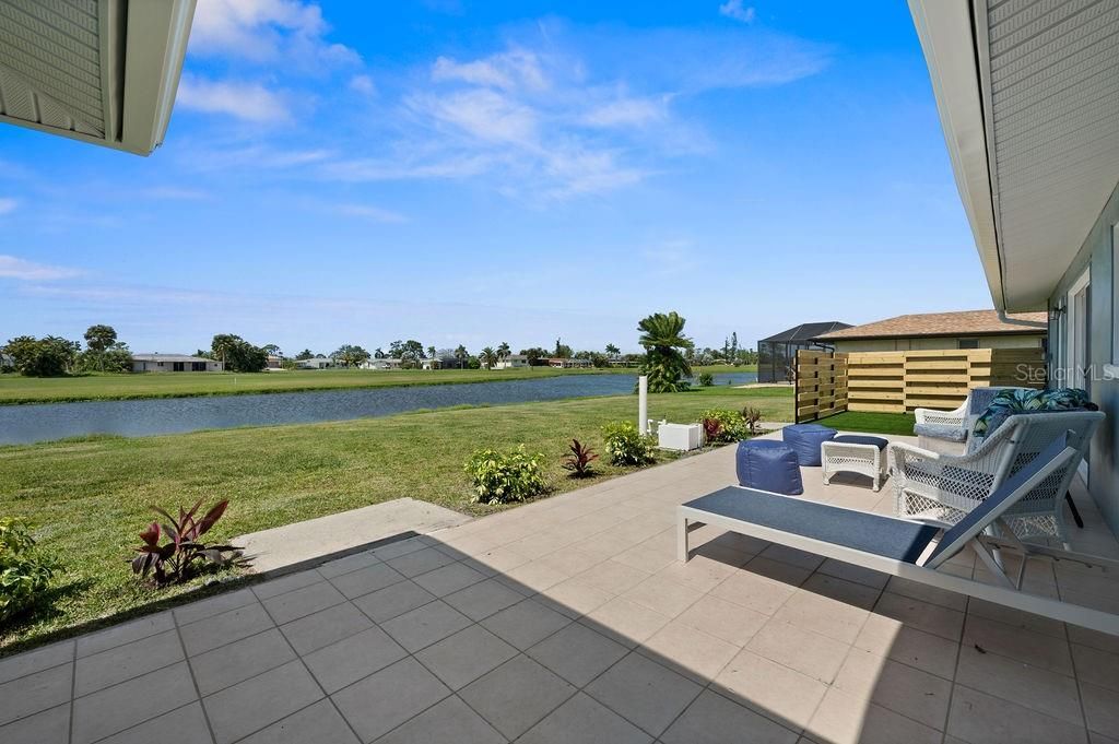 Relax outside with golf and water views