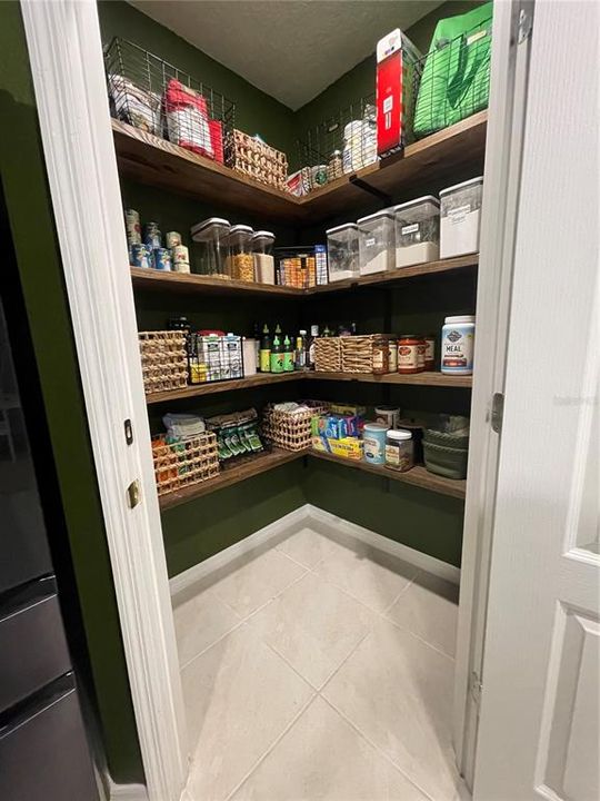Solid wood shelves in pantry.