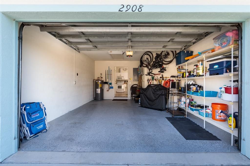 1-car garage & shelving. Remove shelving & room for a golf cart. Epoxy flooring.