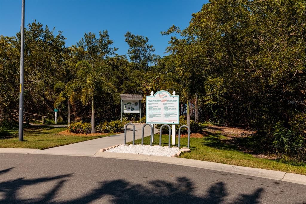 Park with long pier & tropical boardwalks in the community.