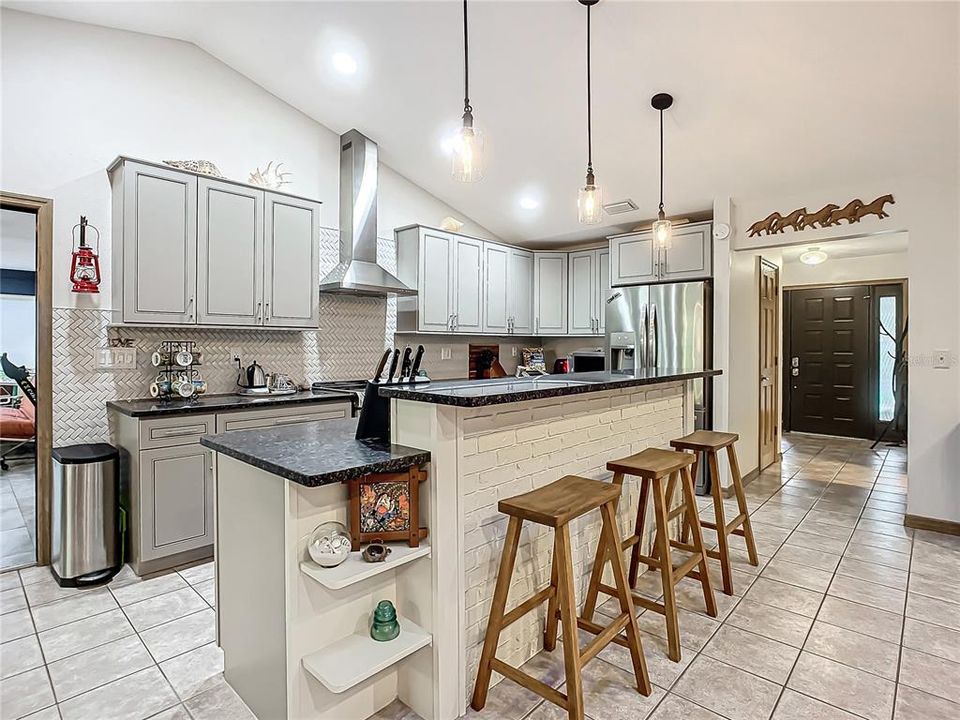 Kitchen & family room Brazil granite, Maple cabinetry