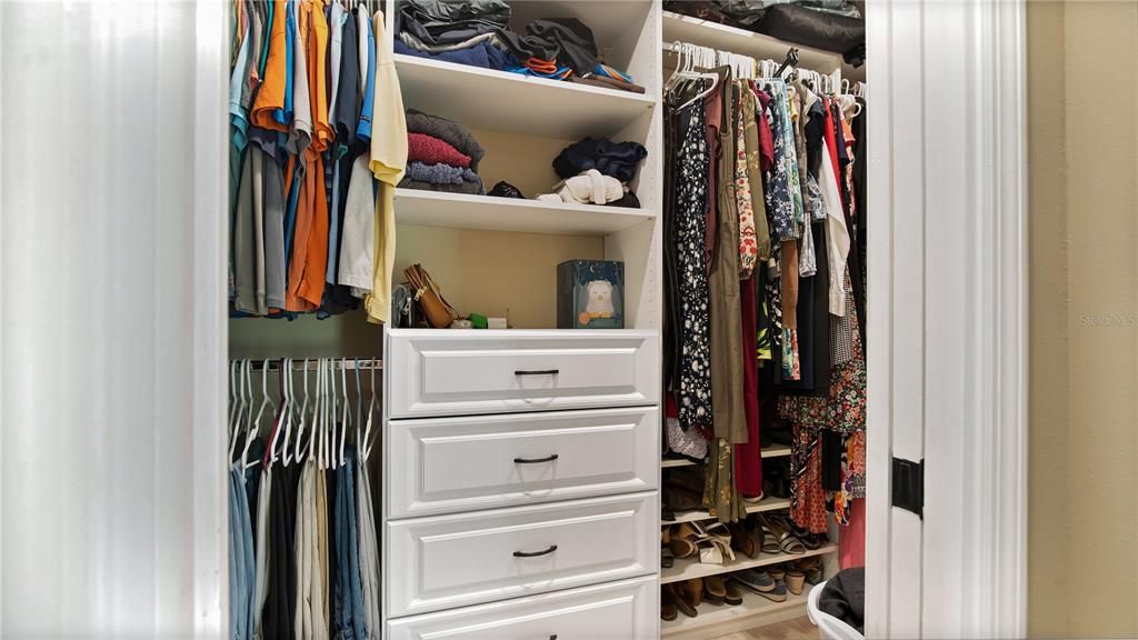 walk-in closet with great closet organization features