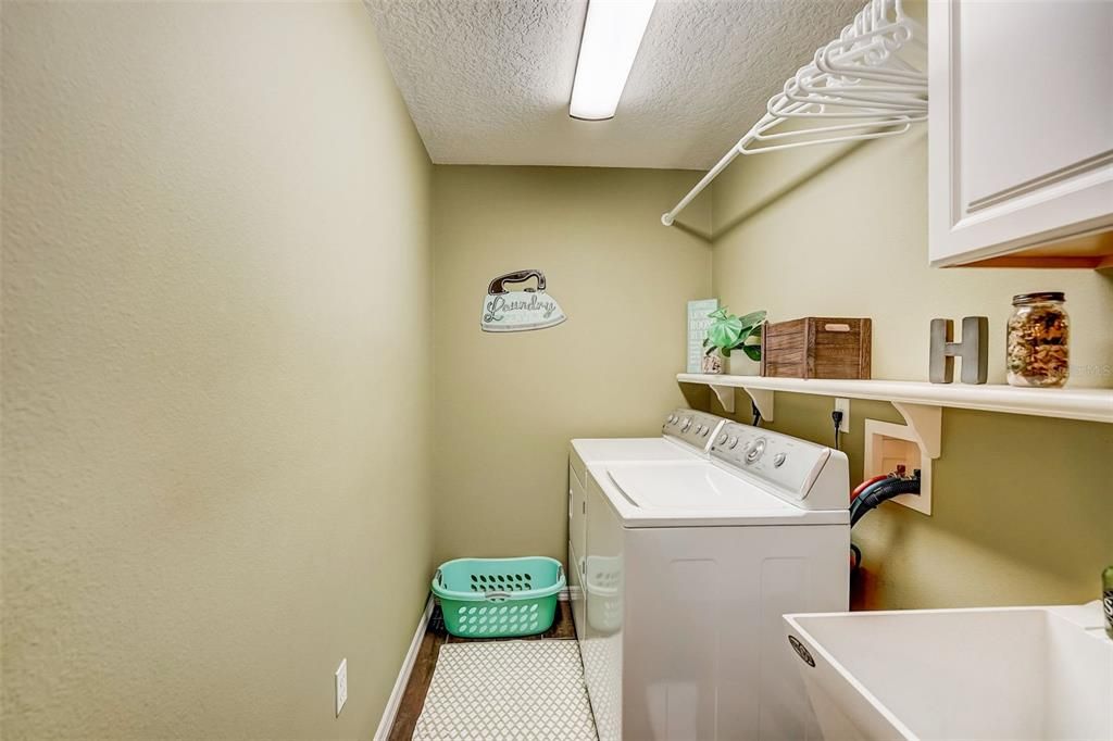 Laundry room in the detached workshop separate from the home