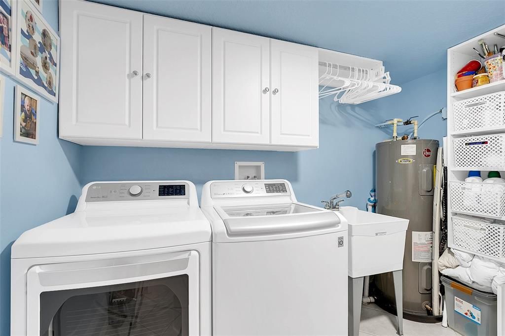 Laundry room with Lots of storage and a laundry sink!!!
