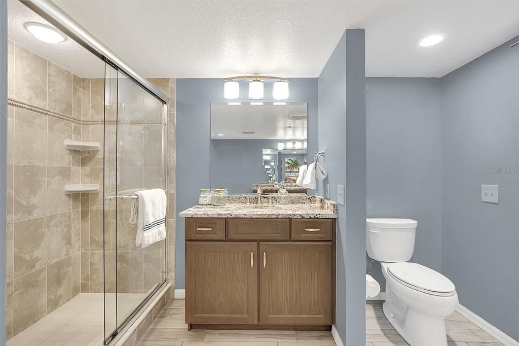 Virtually staged with neutral paint- primary bathroom