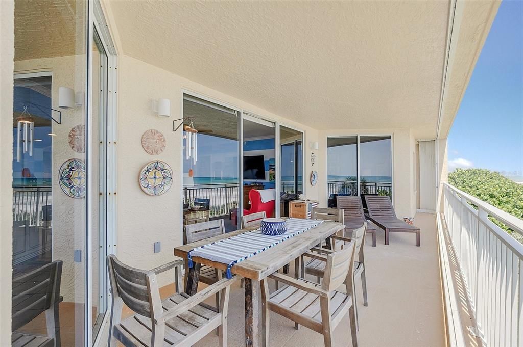 THREE Sliding glass doors bring you out to this Fabulous BALCONY!!