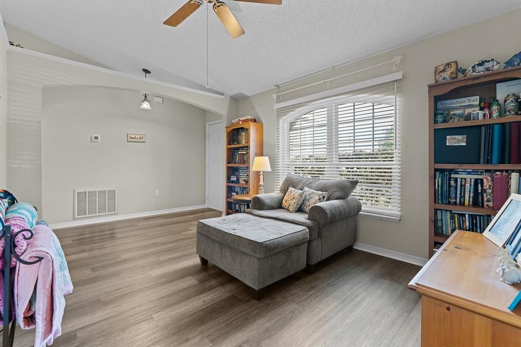 Front living area towards entrance. The cathedral ceilings create a spacious feel throughout this home.