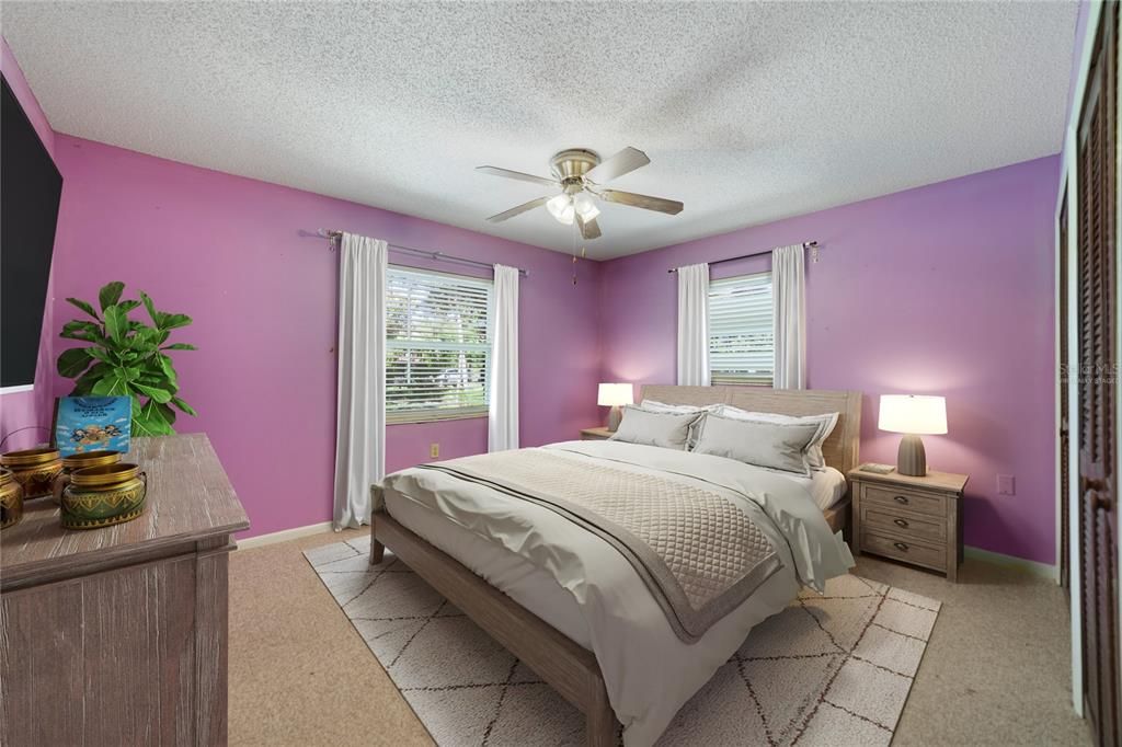 The primary bedroom has dual closets and both bedrooms have easy access to a full and half bath. Virtually Staged.