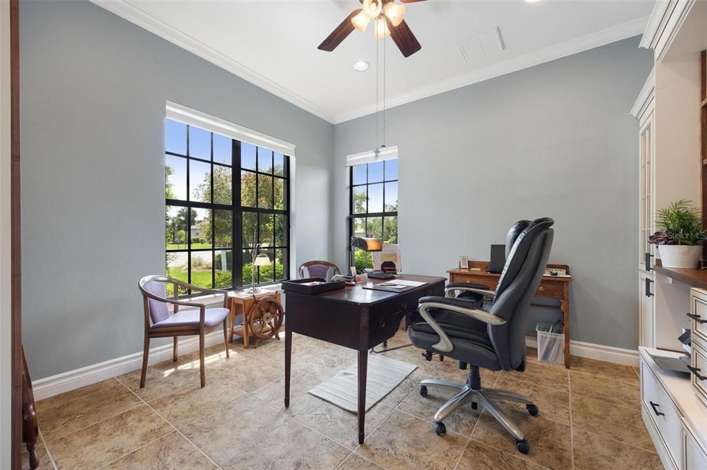 Private office with built in book shelves and glorious natural light. Quiet cul de sac location for peaceful views.