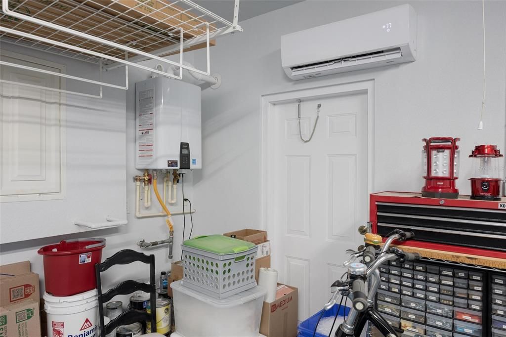 Manabloc water shut off, tankless gas water heater, and mini split AC are just a few of the extras this home comes equipped with. No upgrading needed here.