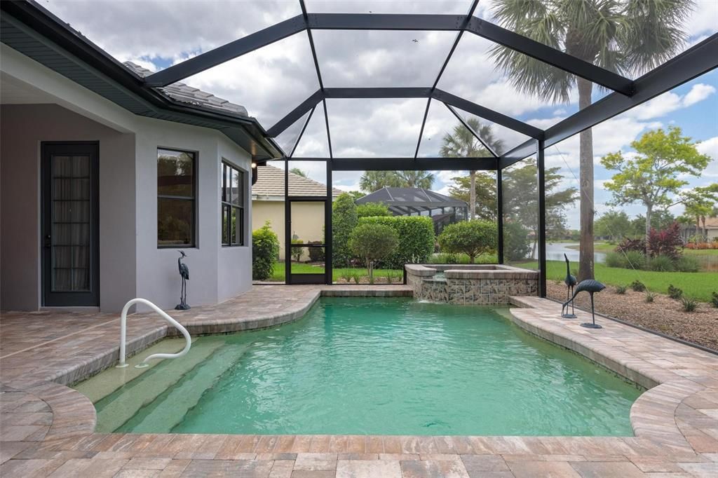 Discover Lake views in this heated saltwater pool. Or relax in the hot tub with waterfall spill over.