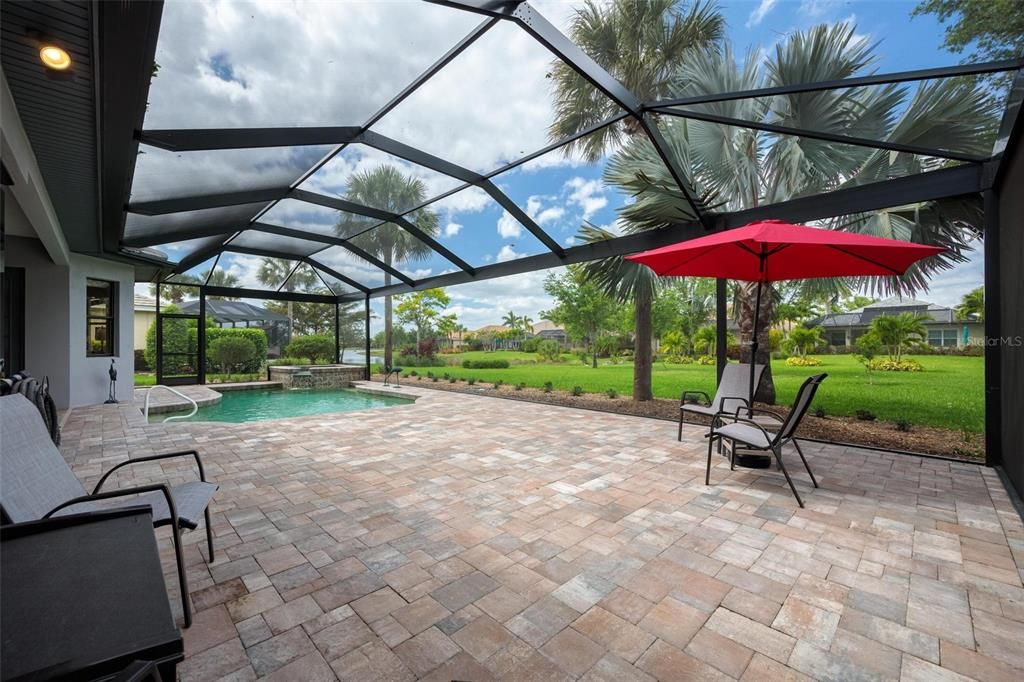 Mature landscaping and water views abound, especially from the picture screen panel. With the expanded patio you can add extra seating options and entertain large gatherings.