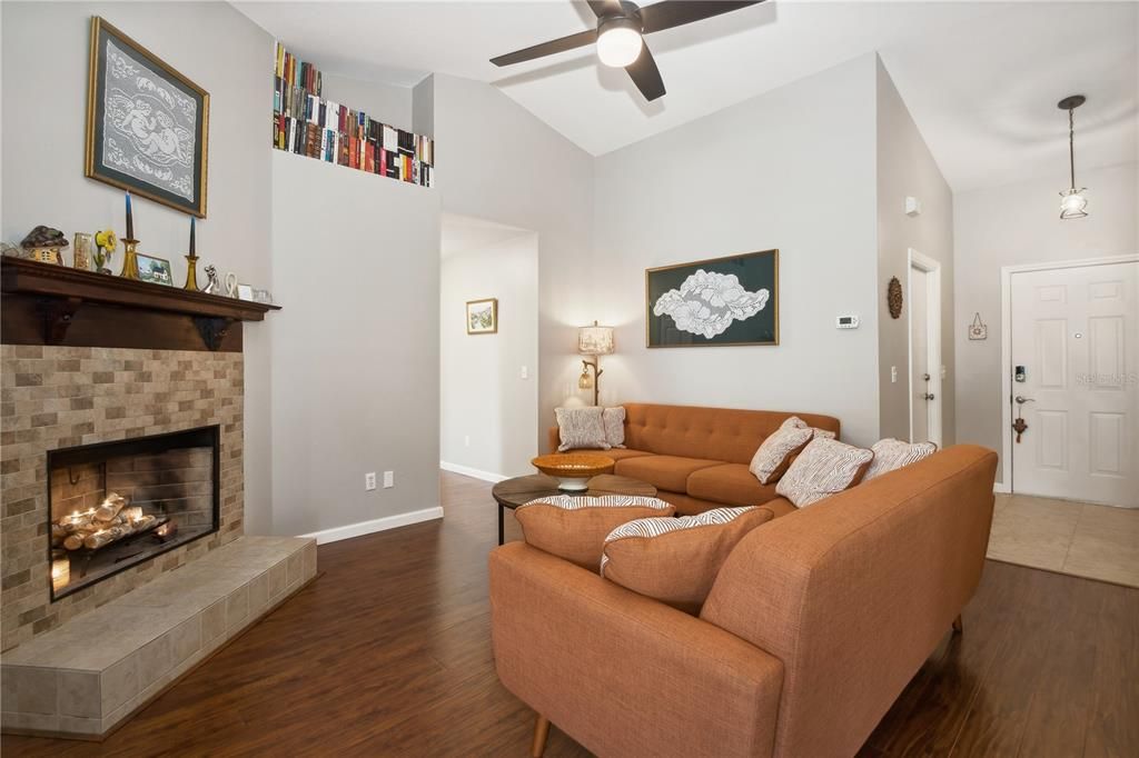 Living room with laminate flooring, new fresh interior paint ceilings included