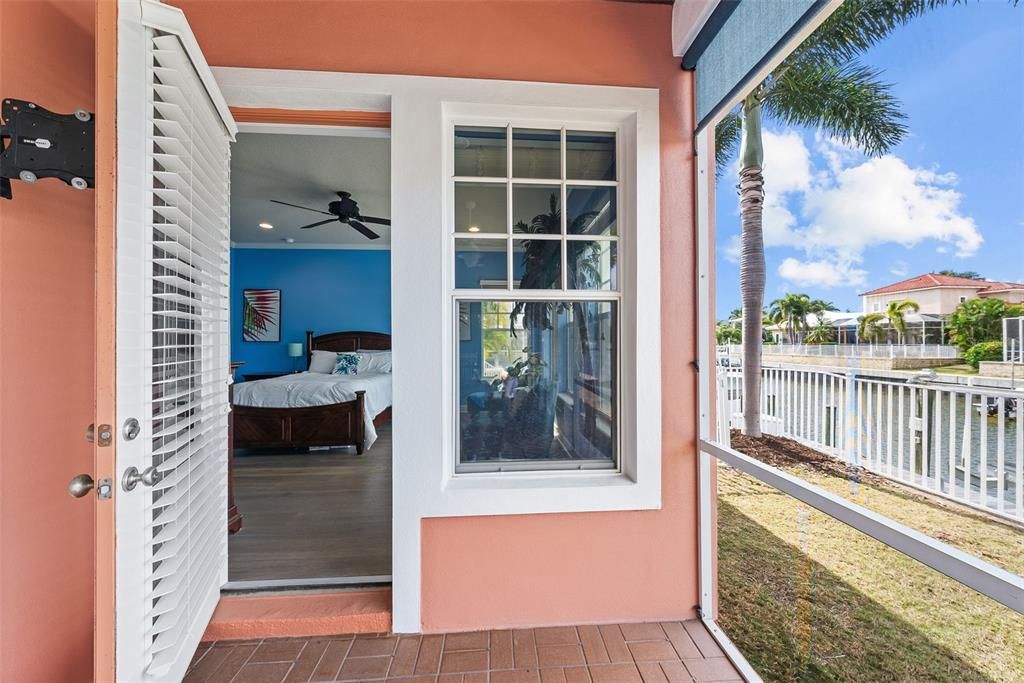 Master Bedroom opens to screened patio