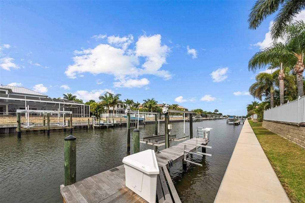 Enjoy the dock and seawall walkway for fishing and nature watching.