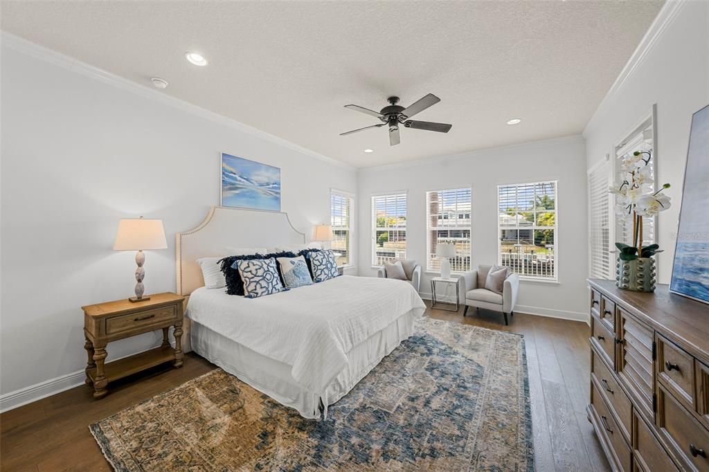 Gorgeous & generous space for the master bedroom with its own access to screened patio. Wake up to views of the water every morning.