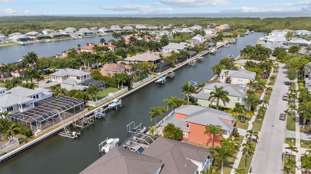 Wide Salt-Water Canal meanders through mangrove channel to Tampa Bay.