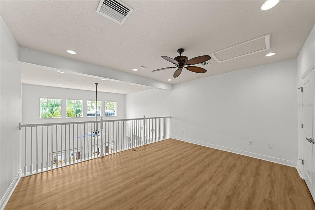 Second floor makes a great gather space for kids or guests. Smartly place storage closet ideal for games, photo albums, etc. And high windows from first floor family room bring in the natural light and allow for enjoyment of the view.