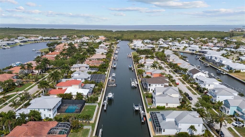 Direct access from canal to bay with no bridges, no lifts.