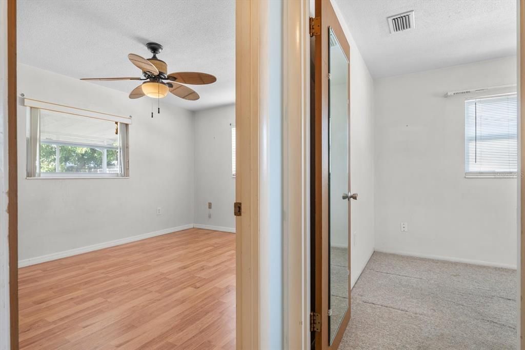 Hall way connecting to other 2 bedrooms
