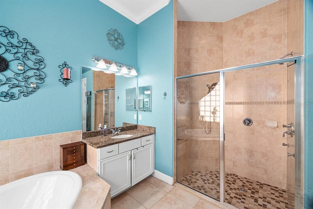 Primary En-Suite with garden tub|shower|split vanities