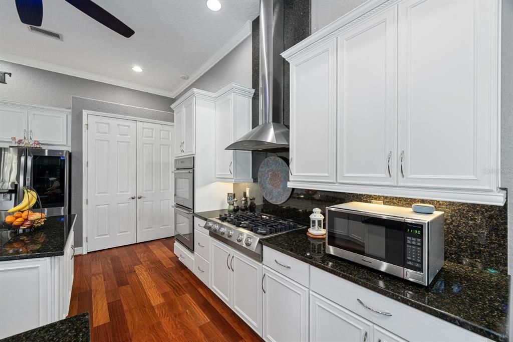 Kitchen with Granite Countertops|Wood Cabinets|Stainless Steel Appliances