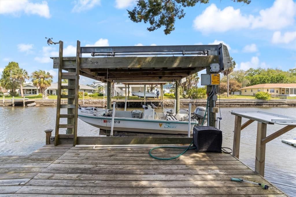 Private boat lift, dock, and fish cleaning station!