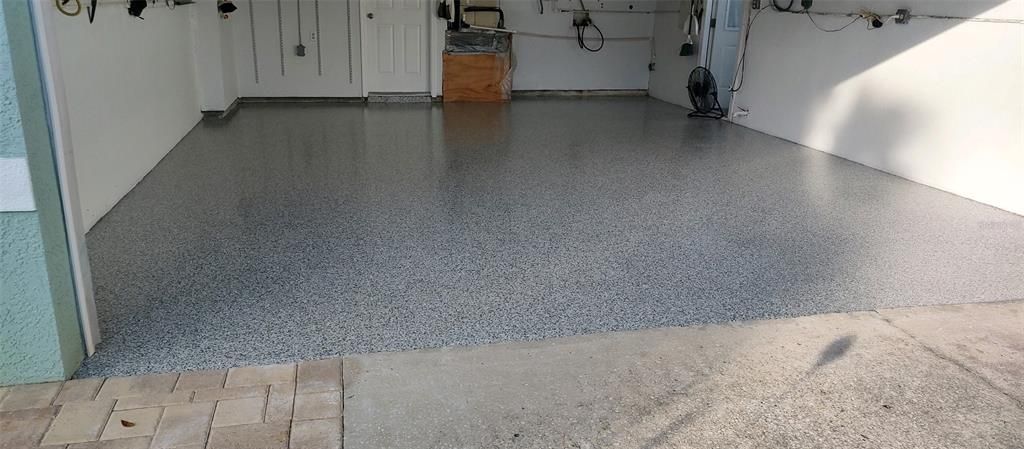 Brand new epoxy flooring in the garage!