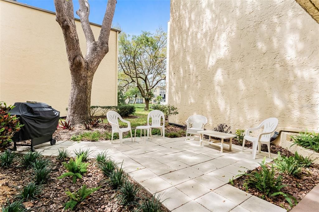 Outdoor grilling area with seating