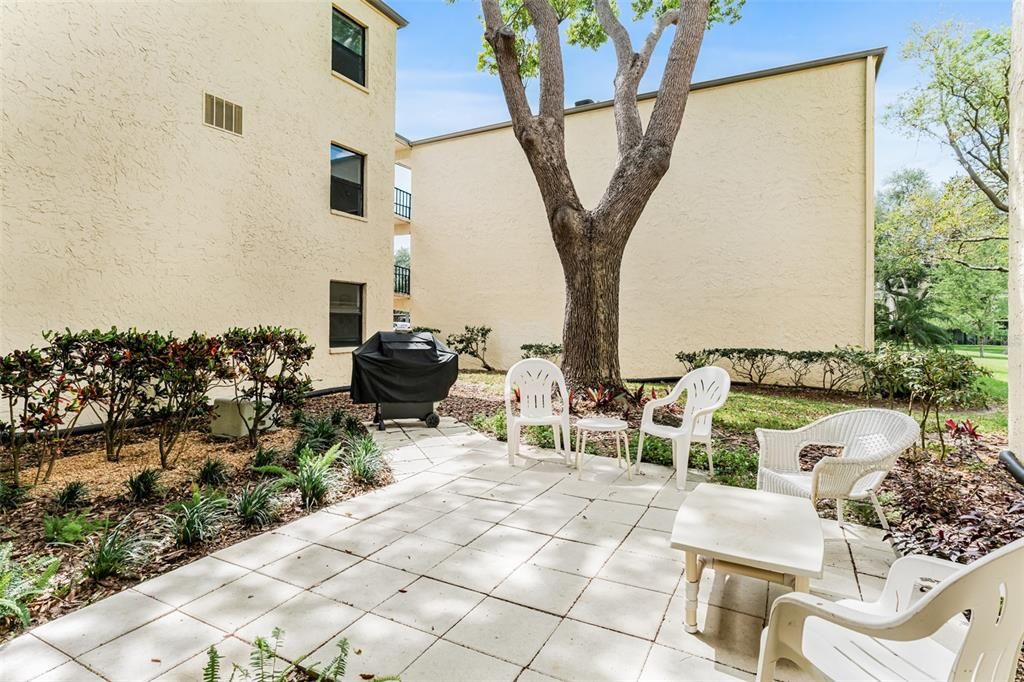 Outdoor grilling area with seating