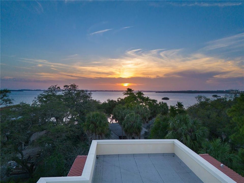 Enjoy breathtaking views of Boca Ciega Bay from the 36' high rooftop terrace.
