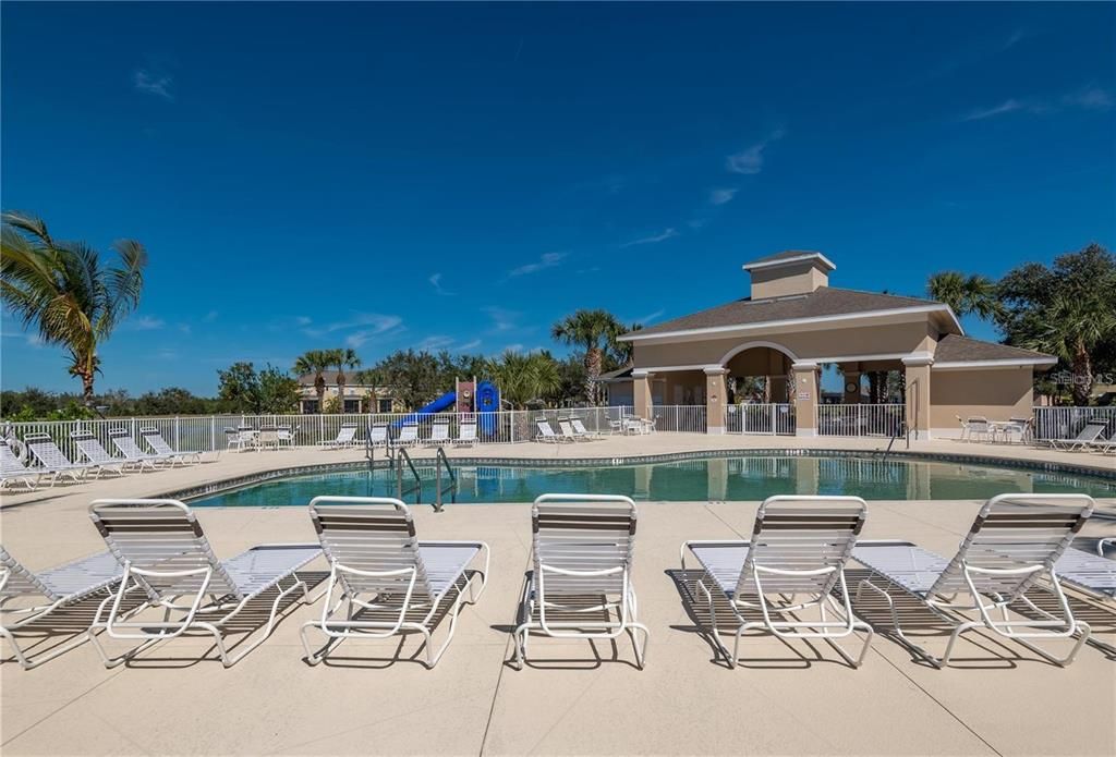 Heated Community Pool with shaded area and restrooms