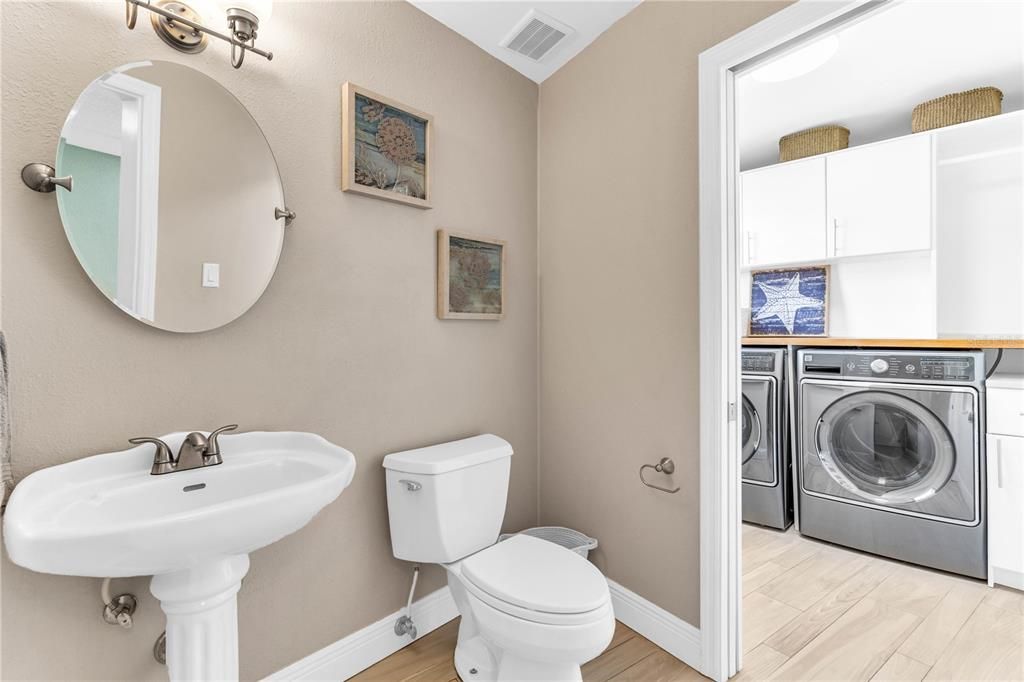 Half bath, with access to the laundry room.