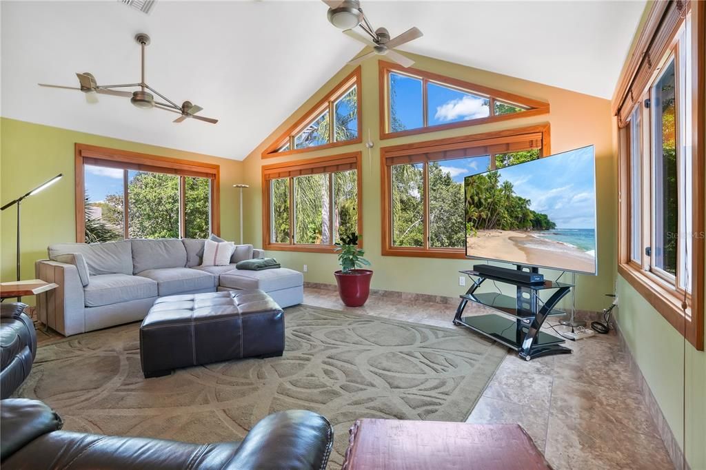 Bonus room with picturesque views of the wooded back yard.