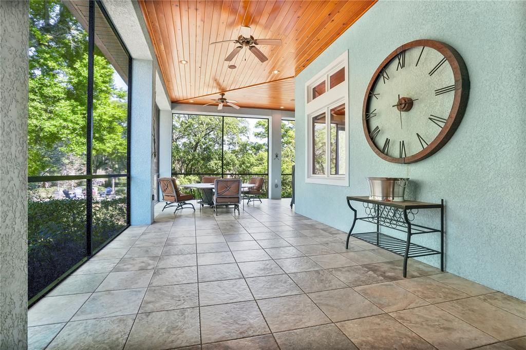 The oversized wrap around screened porch offers so many possibilities from entertaining to fitness.
