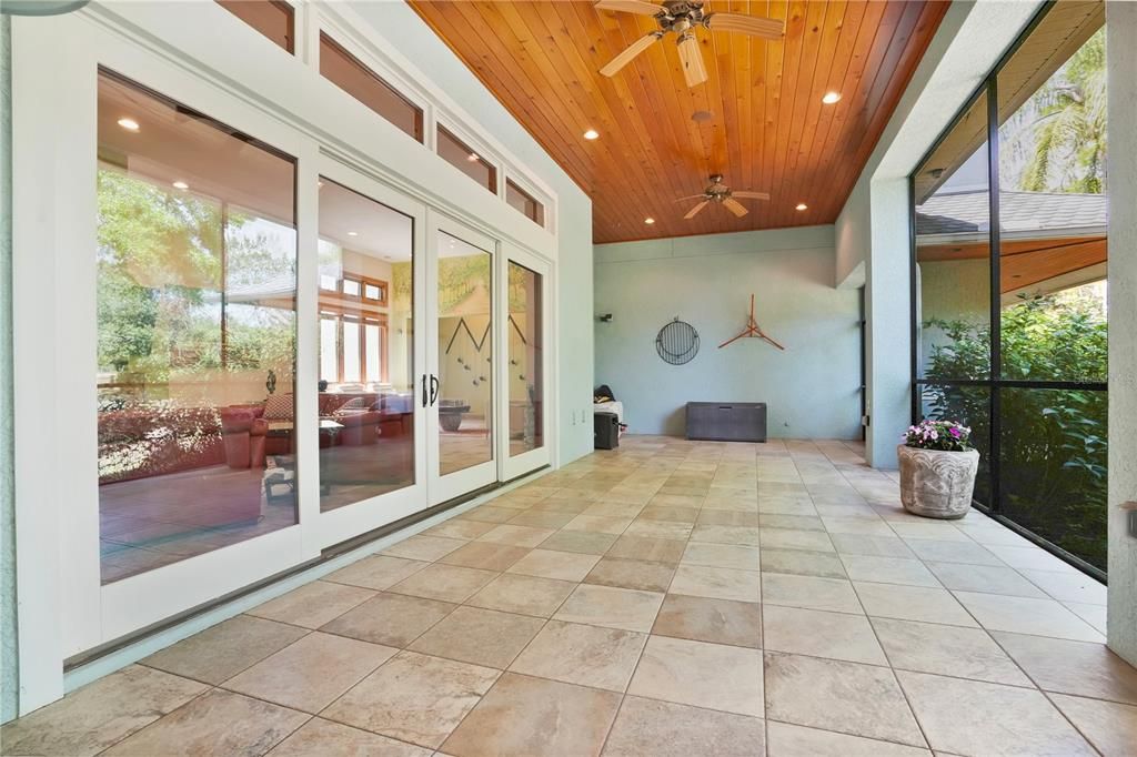 Upgraded porcelain tile floors throughout the screened porch.