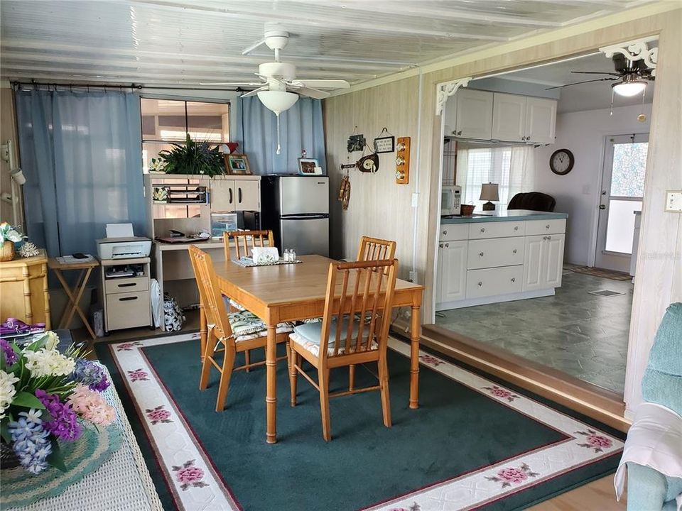 Perfect spot for a large dining table. The enclosed porch is on the other side.
