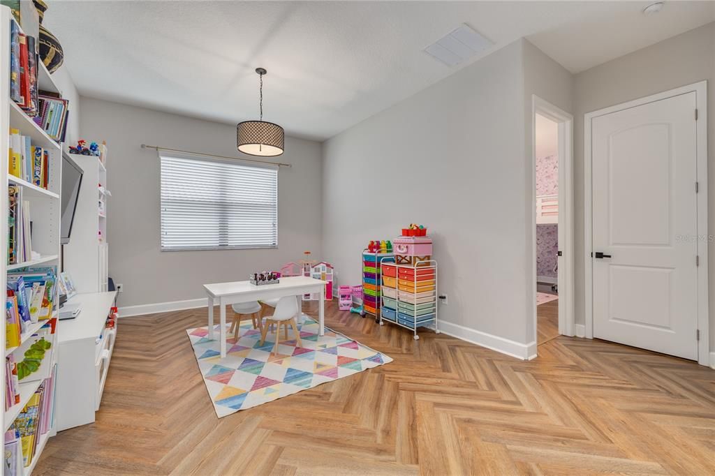 Loft area is perfect for a play room or additional office space