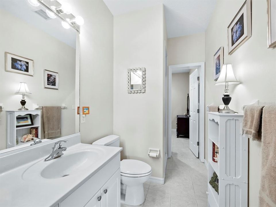 Guest bathroom on first floor with access to 4th bedroom