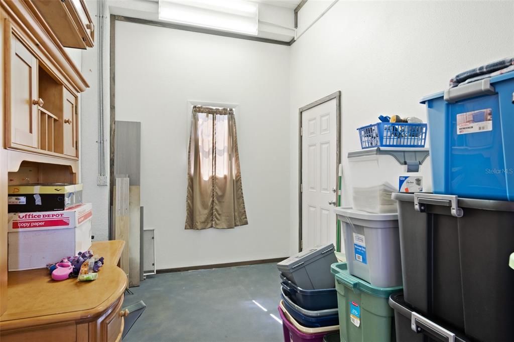 There is also a separate workshop/storage area on the 1st floor, with a door that leads you onto the rear patio.