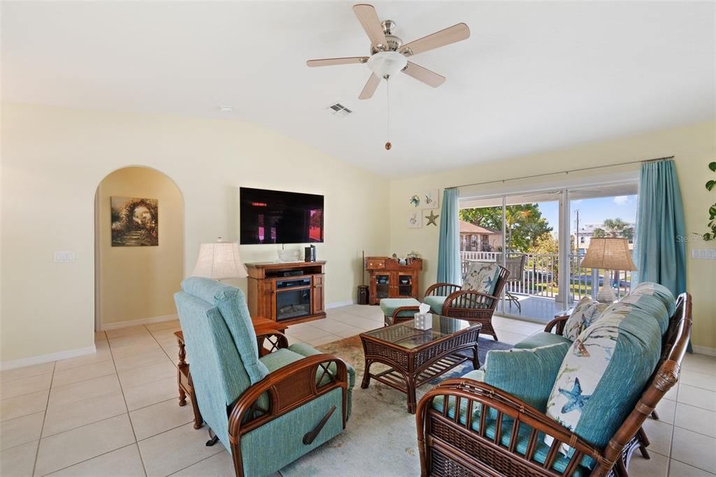 The open concept on the 2nd floor is light & bright with large windows & cathedral ceilings!