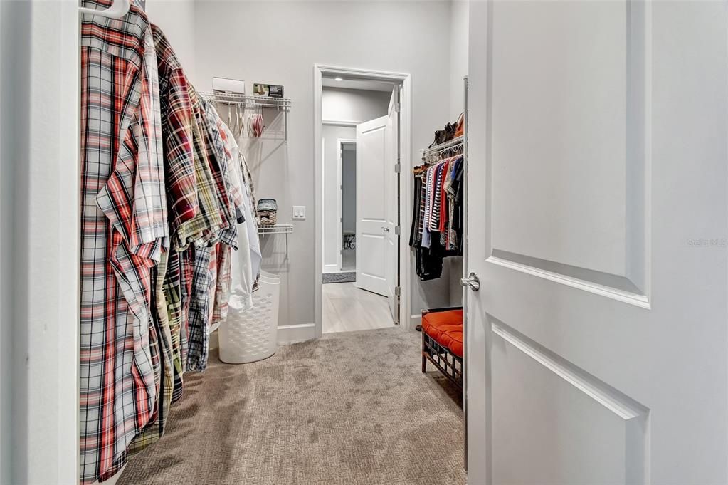 Walk in Closet with laundry room access