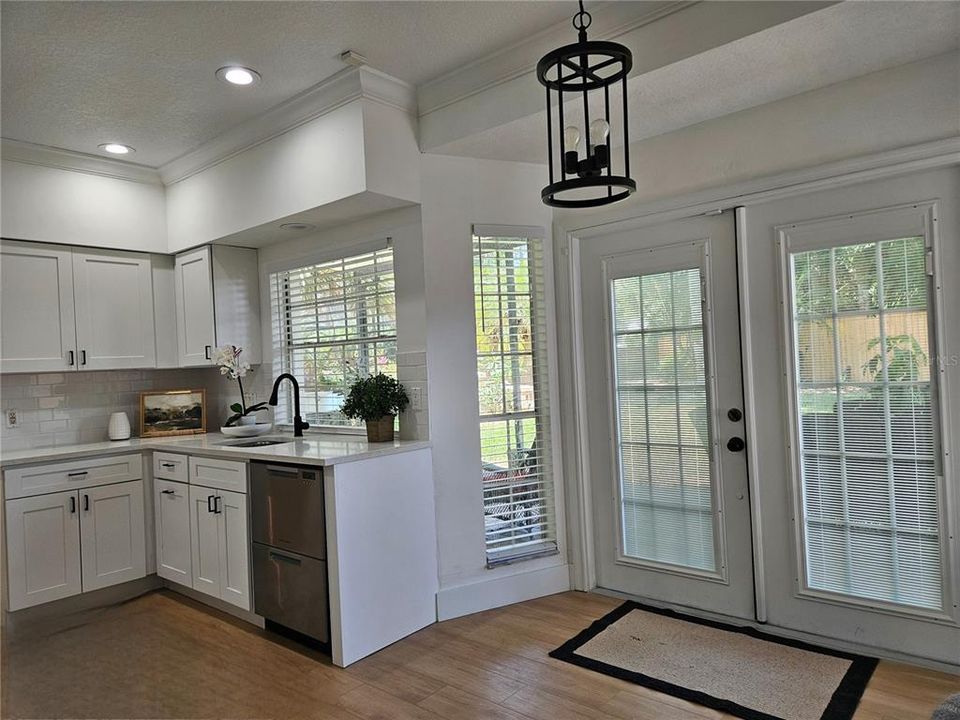 Breakfast nook with French door to the covered patio.