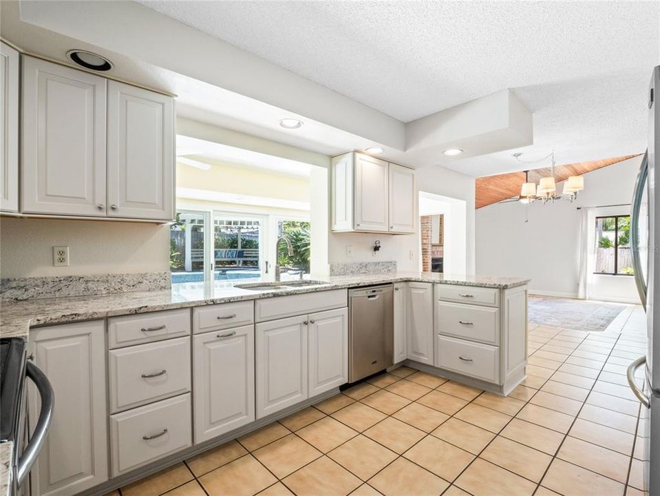 Remodeled Kitchen open to the Family Rm & Pool